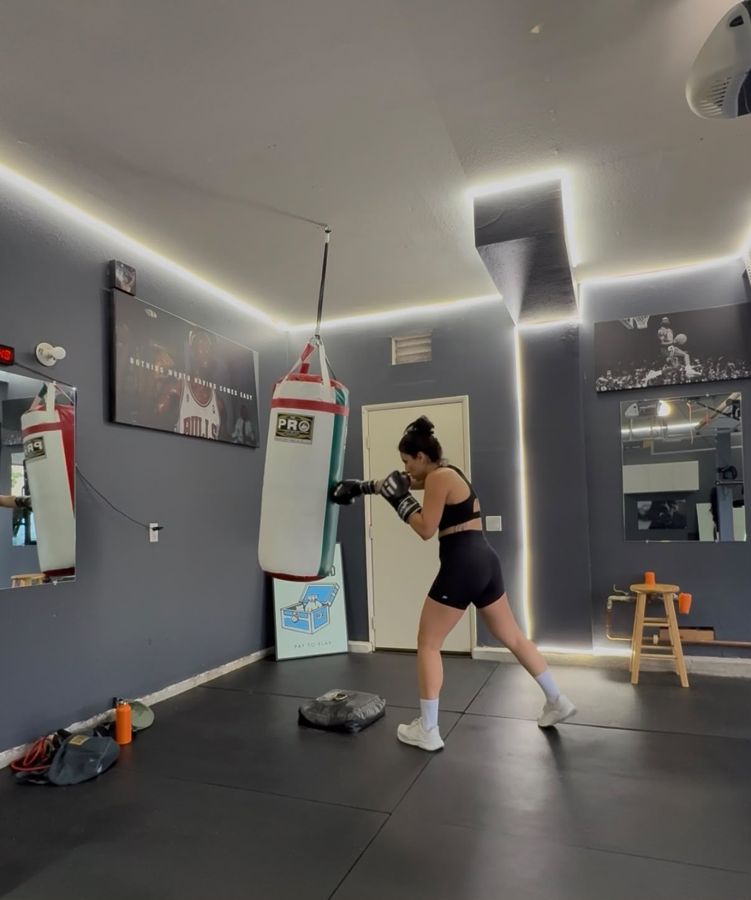 Sahar training on a heavy punching bag