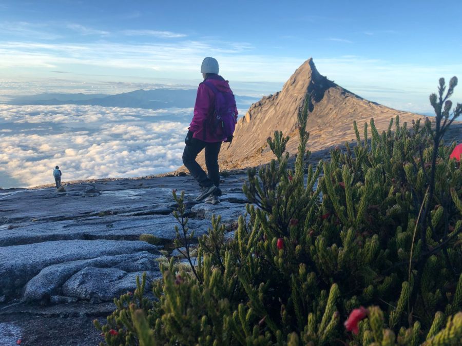 Sahar walking across the granite summit plateau of Mount Kinabalu